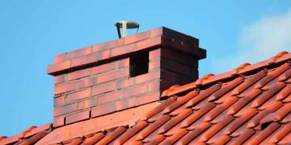 Jak przeprowadzić czyszczenie kominów dymowych?